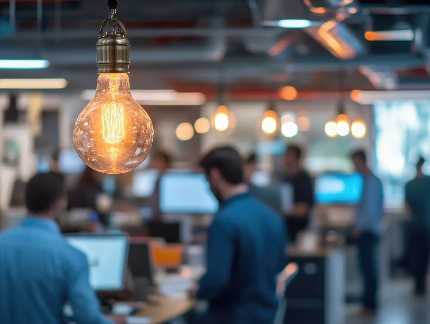 Modern office with focused employees and innovative lighting ambiance