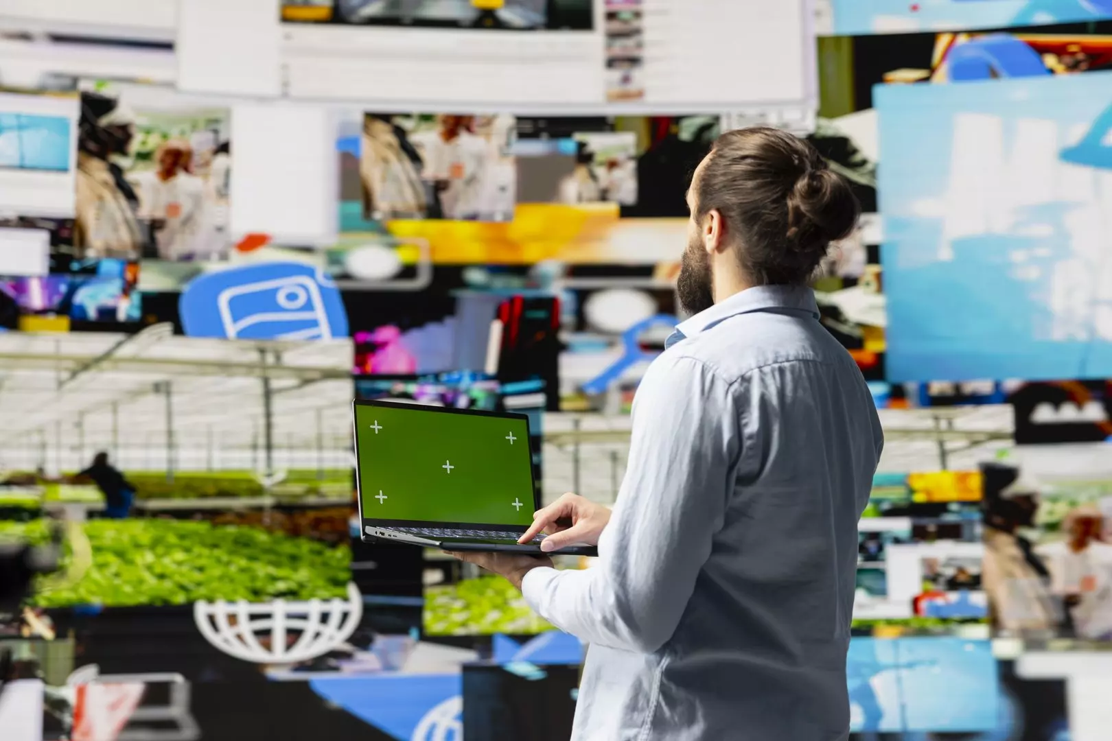 Social media manager uses device with isolated display for online presence